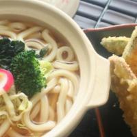 Tempura Udon B · Noodle soup with cabbage, carrots, broccoli, sprouts, seaweed, corn and sweet tofu. Comes wi...