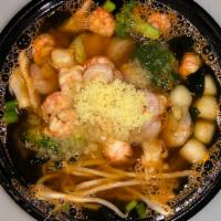 Spicy Udon with Seafood · Noodle soup with cabbage, carrots, broccoli, sprouts, seaweed,corn  and sweet tofu. Spicy. C...