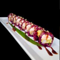 Shrimp Tempura Roll · Crispy shrimp tempura, crab salad, avocado, cucumber sprinkled with eel sauce