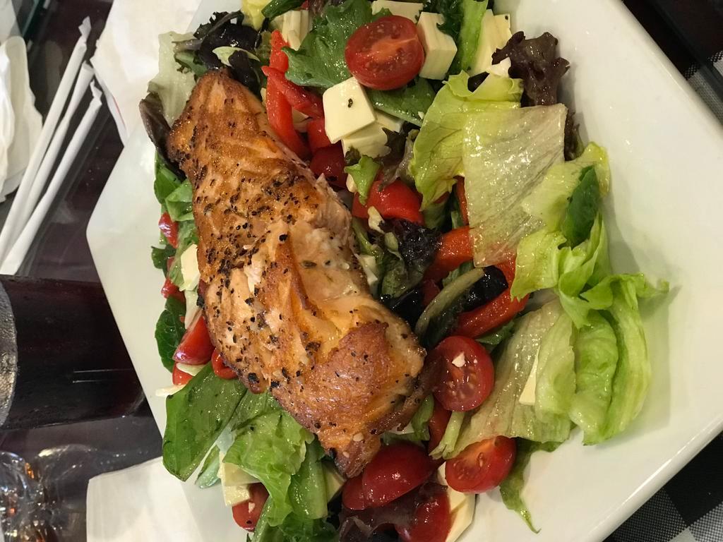 Grilled Salmon · Over mesclun greens and tomatoes with balsamic dressing.