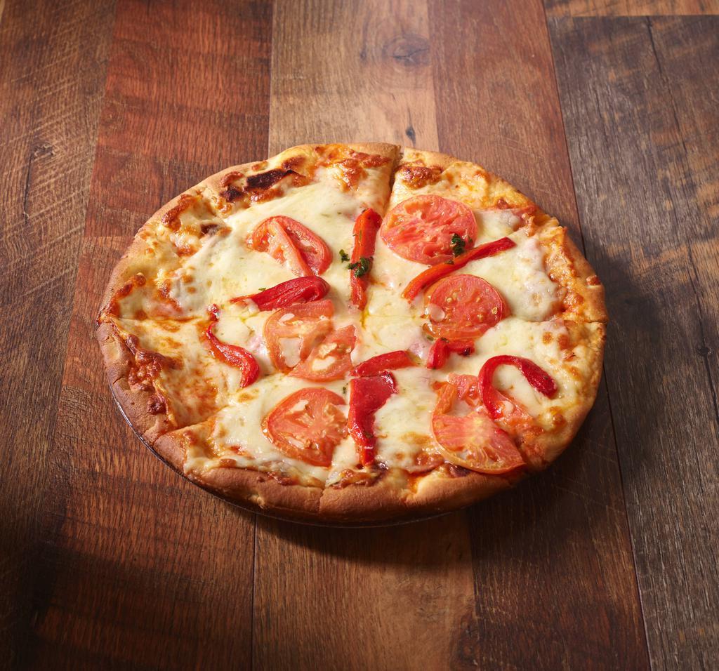 Napolitana Pizza · Mozzarella, ham, marinara, fresh tomato and basil.