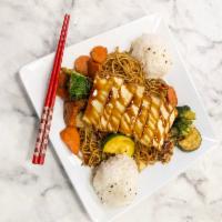 Tofu Yakisoba · Japanese noodles wok-stirred with fresh veggies and
traditional sauce, topped with flash-fr...
