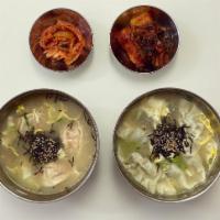 Dumpling Soup 만두국 · Savory soup with dumplings. 