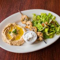 Shrimp Kabab · 8 Large shrimp marinated in spices and olive oil. Served with Med. Salad and rice. Kabab mea...