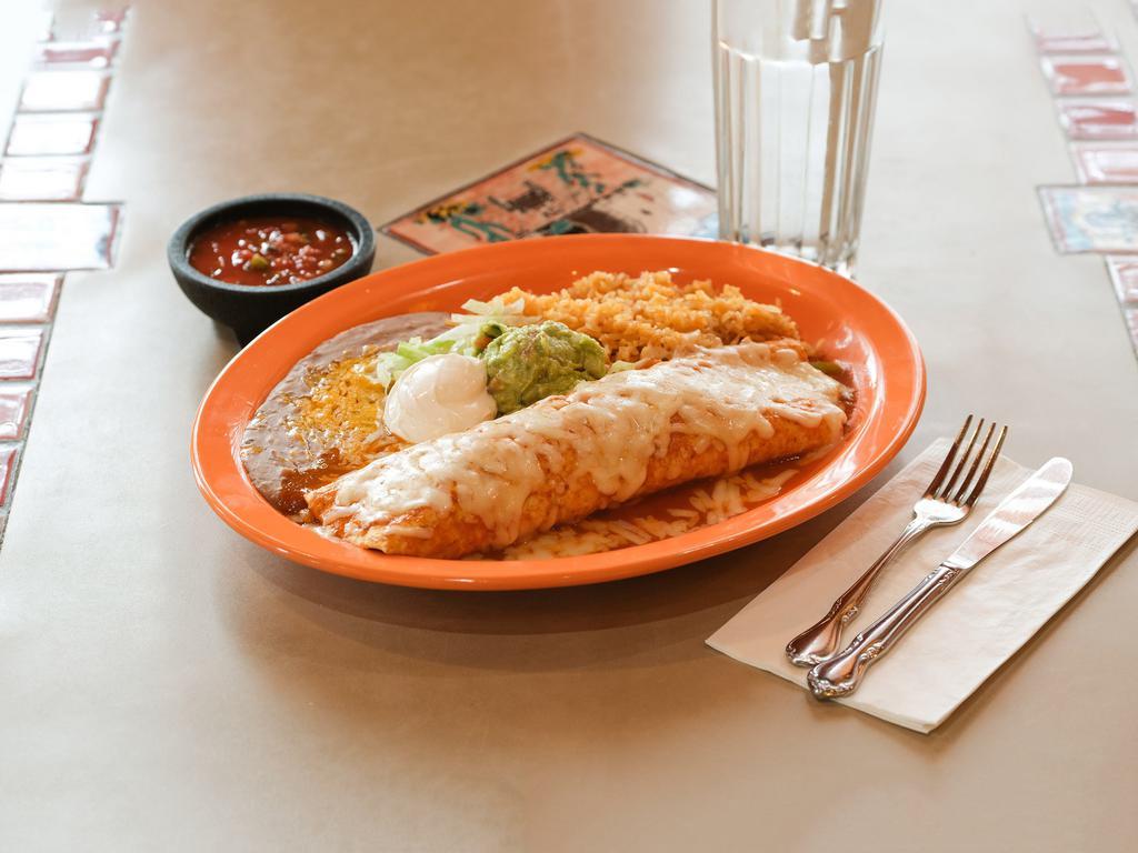 Burrito Especial · Flour tortilla filled with choice of: chicken, steak, shredded pork, or Shrimp
with onions, bell pepper, and melted cheese. Choice of sauce: green tomatillo,
cream, chipotle, mole, or poblano cream sauce. Garnished with lettuce, sour cream
and guacamole.