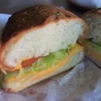 Cheese Melt · Served on a soft, baked French roll with mayonnaise, mustard, lettuce, tomato and red onion....