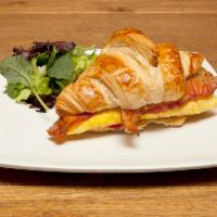 Croissant and Egg Sandwich · Monterey Jack cheese, omelet with spinach, and tomato basil sauce.