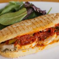 The Moroccan Grilled Panini · Roasted peppers and tomatoes, goat cheese, African spice aioli with chicken, turkey or eggpl...