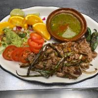 Carnitas San Pancho Style · No rice, no beans. Tender chunks of pork. Served with tortillas, lettuce, tomatoes, guacamol...