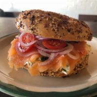bagel & lox · everything bagel, herbed cream cheese, lox, red onion, cherry tomatoes and capers