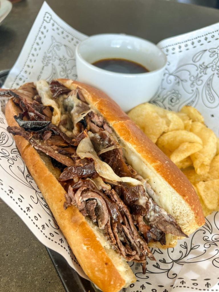 roast beef dip · roast beef, horseradish mayo, caramelized onion and provolone on a hoagie roll with jus.