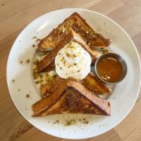 french toast · brioche, with peach rosé jam, whipped cream and pistachios. 
