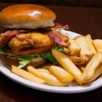 Chicken Club Sandwich · Breaded and deep-fried chicken breast breaded, topped with melted smoked cheddar cheese, cri...