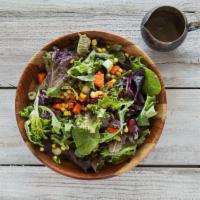 Yogi Salad · Hearty salad of kale, raw veggies, rajma beans, and chickpea puffs. Citrus dressing served o...
