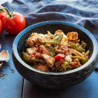 Karahi Paneer · Wok-tossed Indian cheese with green peppers and tomatoes. Vegetarian and gluten free.