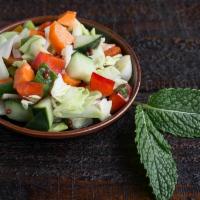 Kachumbar Salad · Chopped veggies with a citrus lime dressing. Vegan.