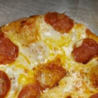 Pepperoni Grilled Flatbread · Pepperoni slices and mozzarella cheese over zesty tomato sauce.