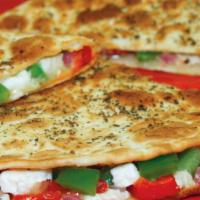 Mediterranean Quesadilla · Roasted red peppers, basil, red onions, black olives, green peppers and feta cheese with cre...