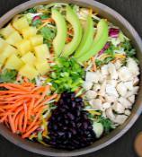 Tropical Power Blend Bowl · Grilled chicken, pineapple, carrots, avocado, black bean, scallions,lettuce,spinach serve wi...