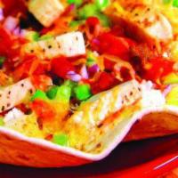 Chicken Fajita Rice Bowl · Grilled chicken, green peppers, red onions, mild salsa, brown rice, cheddar Jack cheese serv...