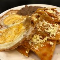 RED CHILAQUILES PLATE · CHILAQUILES, EGGS, COTIJA CHEESE & BEANS