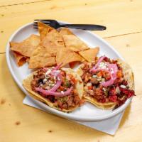 Brisket Taco Plate · 3 Grilled Brisket tacos topped with Pico de gallo, jalapeño salsa, pickled red onions, shred...