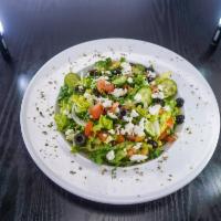 Greek Salad · Lettuce, tomato, onion, olives, feta cheese, and Greek dressing.