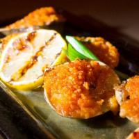 5 Concha Rellena · Stuffed baked clams with garlic mojo sauce.