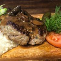 MAMA’S STYLE MEATLOAF · Polish meatball in creamy gravy over Babcia’s potato pancakes