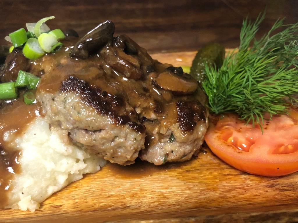 MAMA’S STYLE MEATLOAF · Polish meatball in creamy gravy over Babcia’s potato pancakes