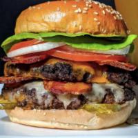 DOUBLE BACON CHEESEBURGER · Two beef patties, American cheese, bacon, lettuce, tomato, onions and pickles
