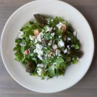 Greek Salad · Crisp romaine, tomatoes, feta, kalamata olives, cucumbers, red onion, grape leaves, house Gr...