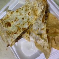 Steak Quesadilla · Topped with sour cream