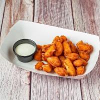 Wisconsin White Cheddar Cheese Curds · White cheddar cheese curds breaded and served with house-made ranch dressing.