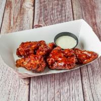 Jumbo Chicken Wings · 5 or 10 extra-jumbo breaded chicken wings with your choice of bourbon, BBQ, teriyaki or Caju...