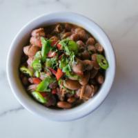Borracho Beans · Cooked up with bacon, onion & garlic &
simmered in beer for big cowboy flavors.