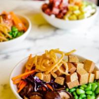 Vegan Bowl · Brown of rice, with crispy tofu, shiitake mushrooms, carrots, edamame, crispy onion & poke s...