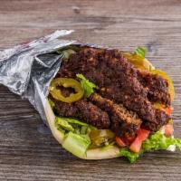 Chapli Kabab Sandwich · 100% Ground Beef kabab patty served with pita, lettuce, tomato, onions, cucumber, Our signat...
