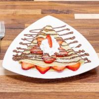 Strawberry Tella Crepe · Strawberry, Nutella & powder sugar. (Whipped Cream not served with delivery)
