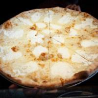 White Pizza · Extra mozzarella, spotted with whole milk ricotta, imported goat grated Romano cheese and fr...