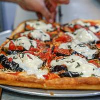 Eggplant Delight Pizza · Rectangular pan pizza with eggplant, fresh mozzarella, and plum tomato sauce, topped with ba...