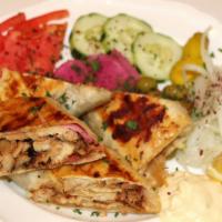 Arabic Shawarma Chicken Sandwich  ( Saj ) · Chicken Shawarma Wrapped with Saj Flatbread. With Special homemade Sauce, Served with Steak ...