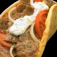 Gyro Lamb Wrap · Grilled Lamb on Skewer, Served With Flatbread pita,  tomatoes, Onions, Lettuce And Tzatziki ...
