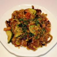 Eggplant Salad · Fried eggplant slices mixed with fresh green and red peppers and onions in summer special sa...