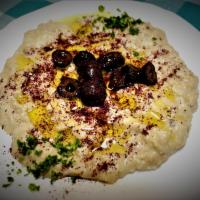 Baba Ghanoush · Grilled eggplant slices ground together with garlic, spices and lemon juice and served with ...