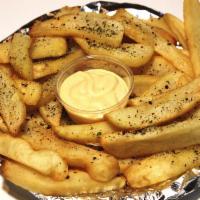 French Steak Fries · Crisp and seasoned with house blend herbs and spices. Vegetarian.