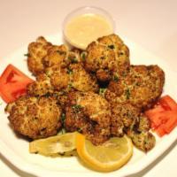 Cauliflower Salad · Fried cauliflower, served crispy with parsley, olive oil and a mix of spices. Vegetarian.