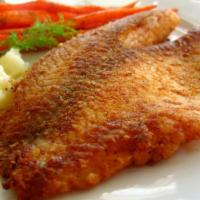 Tilapia Fillet · 2 fillet seasoned with spices, served on rice, with lemon and pickles.