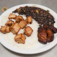 Massitas De Puerco · Pork cubes marinated in mojo and deep fried. Served with maduros, white rice and black beans...