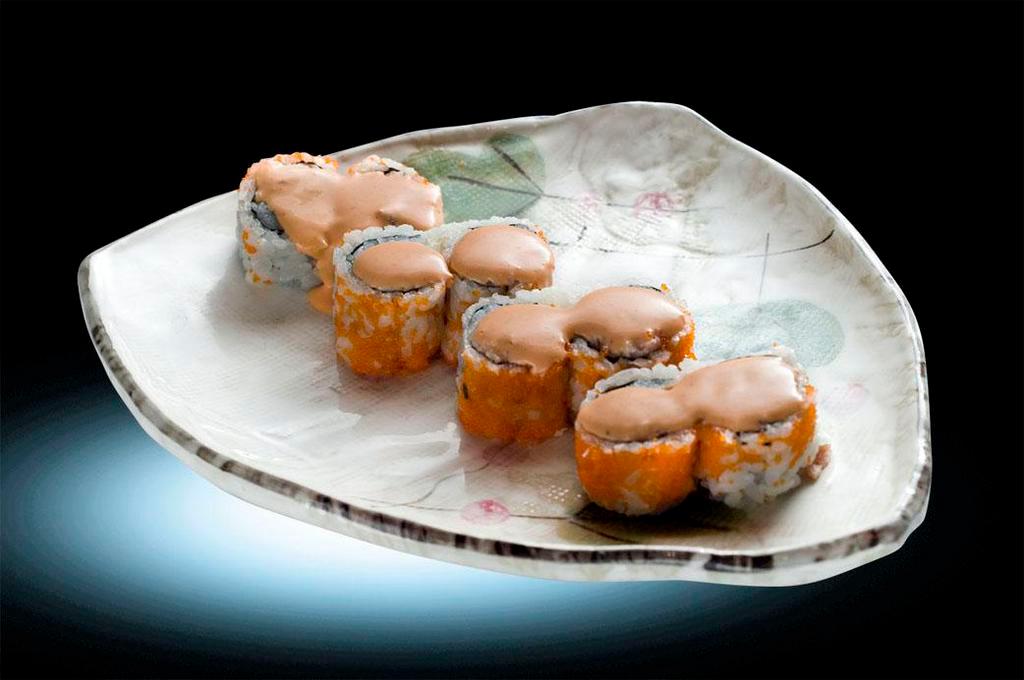 Seafood Roll · 4 kinds of raw fish and crab stick, top with masago fish egg and spicy mayo.